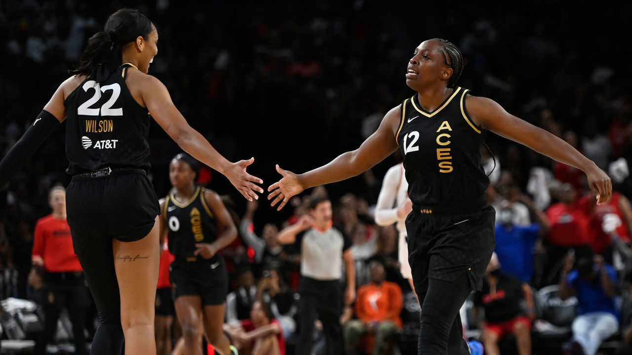 LAS VEGAS, NV - AUGUST 17: A'ja Wilson #22 of the Las Vegas Aces high fives Chelsea Gray #12 of the Las Vegas Aces during Round 1 Game 1 of the 2022 WNBA Playoffs on August 17, 2022 at Michelob ULTRA Arena in Las Vegas, Nevada. Mandatory Copyright Notice: Copyright 2022 NBAE