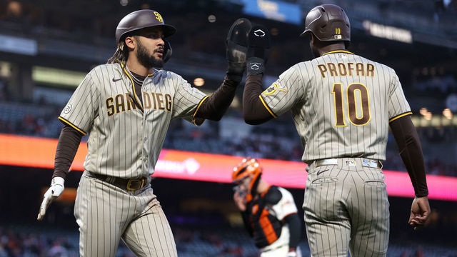 SAN FRANCISCO, CALIFORNIA - SEPTEMBER 15: Fernando Tatis Jr. #23 of the San Diego Padres is congratulated by Jurickson Profar #10 after he scored in the first inning against the San Francisco Giants at Oracle Park on September 15, 2021 in San Francisco, California.