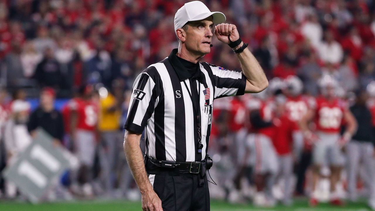 GLENDALE, AZ - DECEMBER 28: A referee signals targeting during the Fiesta Bowl college football playoff semi final game between the Clemson Tigers and the Ohio State Buckeyes on December 28, 2019 at State Farm Stadium in Glendale, Arizona.