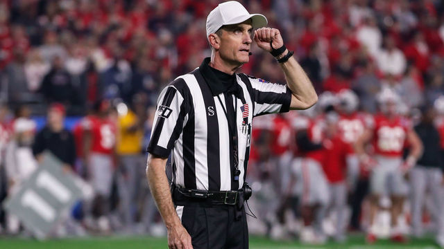 GLENDALE, AZ - DECEMBER 28: A referee signals targeting during the Fiesta Bowl college football playoff semi final game between the Clemson Tigers and the Ohio State Buckeyes on December 28, 2019 at State Farm Stadium in Glendale, Arizona.