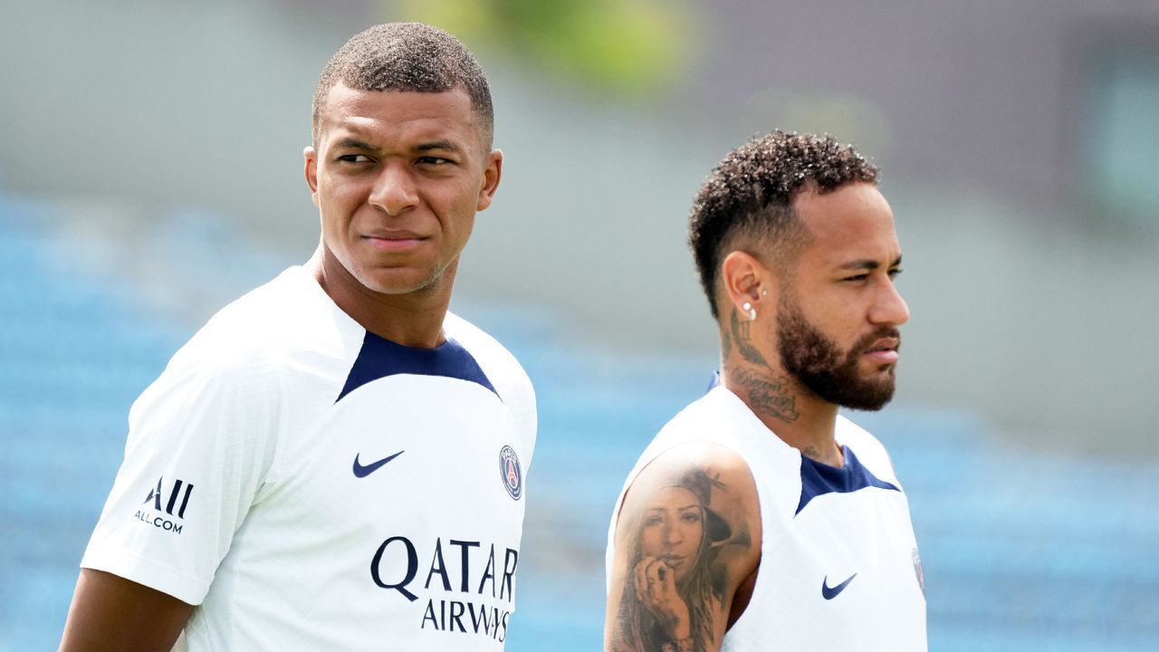 TOKYO, JAPAN - JULY 18: (L-R) Neymar Jr and Kylian Mbappe of Paris Saint-Germain look on the Paris Saint-Germain Japan Tour Kids Clinic at Prince Chichibu Memorial Rugby Ground on July 18, 2022 in Tokyo, Japan.