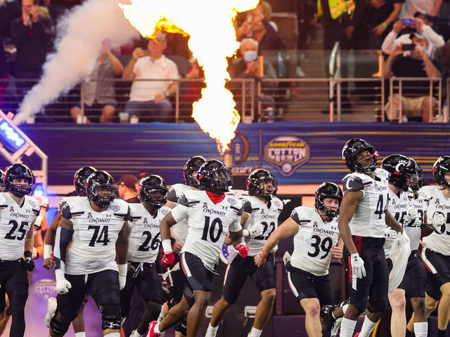 ARLINGTON, TEXAS - DECEMBER 31: Cincinnati Bearcat players take the field prior to playing the Alabama Crimson Tide in the Goodyear Cotton Bowl Classic for the College Football Playoff semifinal game at AT&T Stadium on December 31, 2021 in Arlington, Texas.