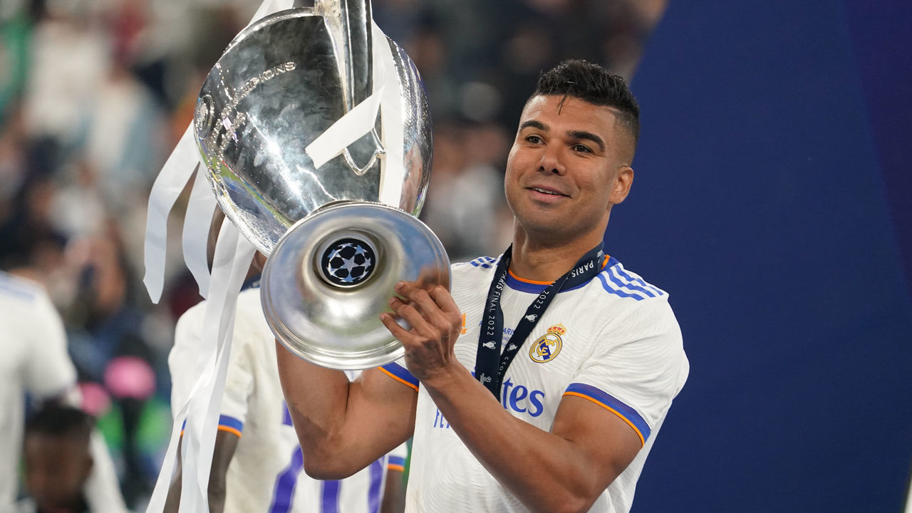 PARIS, FRANCE - MAY 28: Casemiro of Real Madrid celebrates with the trophy after the UEFA Champions League final match between Liverpool FC and Real Madrid at Stade de France on May 28, 2022 in Paris, France.