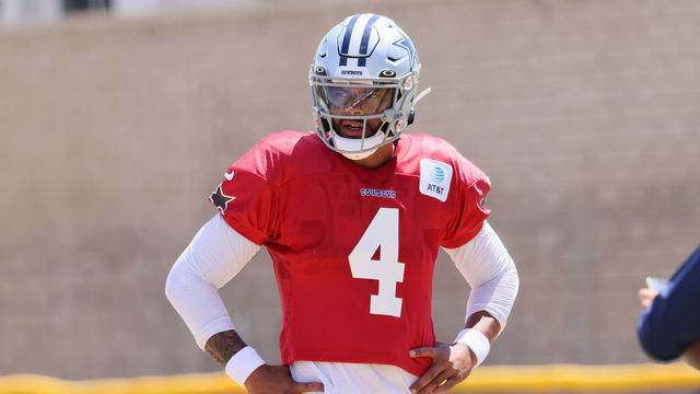 OXNARD, CALIFORNIA - AUGUST 09: Quarterback Dak Prescott #4 of the Dallas Cowboys looks on during training camp at River Ridge Fields on August 09, 2022 in Oxnard, California.