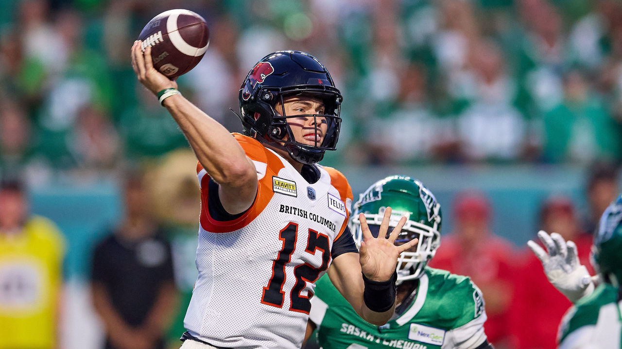 REGINA, SK - AUGUST 19: Nathan Rourke #12 of the BC Lions throws a pass in first half action in the game between the BC Lions and Saskatchewan Roughriders at Mosaic Stadium on August 19, 2022 in Regina, Canada.