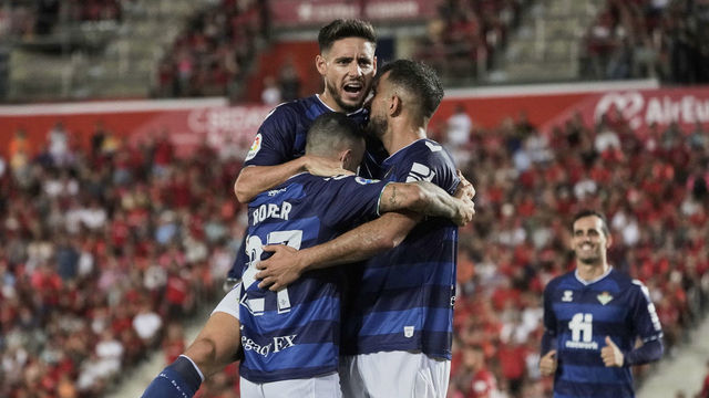 MALLORCA, SPAIN - AUGUST 20: Borja Iglesias of Real Betis celebrates scoring his team's second goal with teammates during the LaLiga Santander match between RCD Mallorca and Real Betis at Estadi de Son Moix on August 20, 2022 in Mallorca, Spain.
