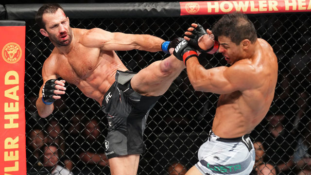 SALT LAKE CITY, UTAH - AUGUST 20: (L-R) Luke Rockhold kicks Paulo Costa of Brazil in a middleweight fight during the UFC 278 event at Vivint Arena on August 20, 2022 in Salt Lake City, Utah.