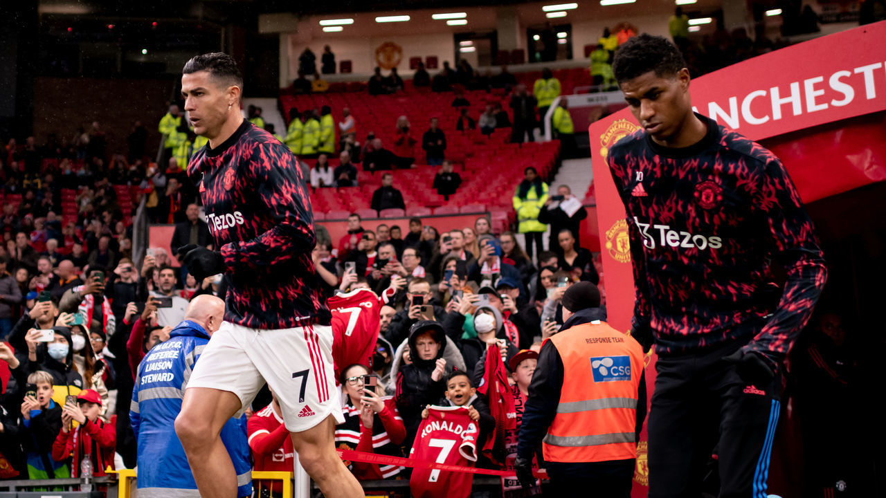 MANCHESTER, ENGLAND - MAY 02: Cristiano Ronaldo and Marcus Rashford of Manchester United warm up prior to the Premier League match between Manchester United and Brentford at Old Trafford on May 2, 2022 in Manchester, United Kingdom.