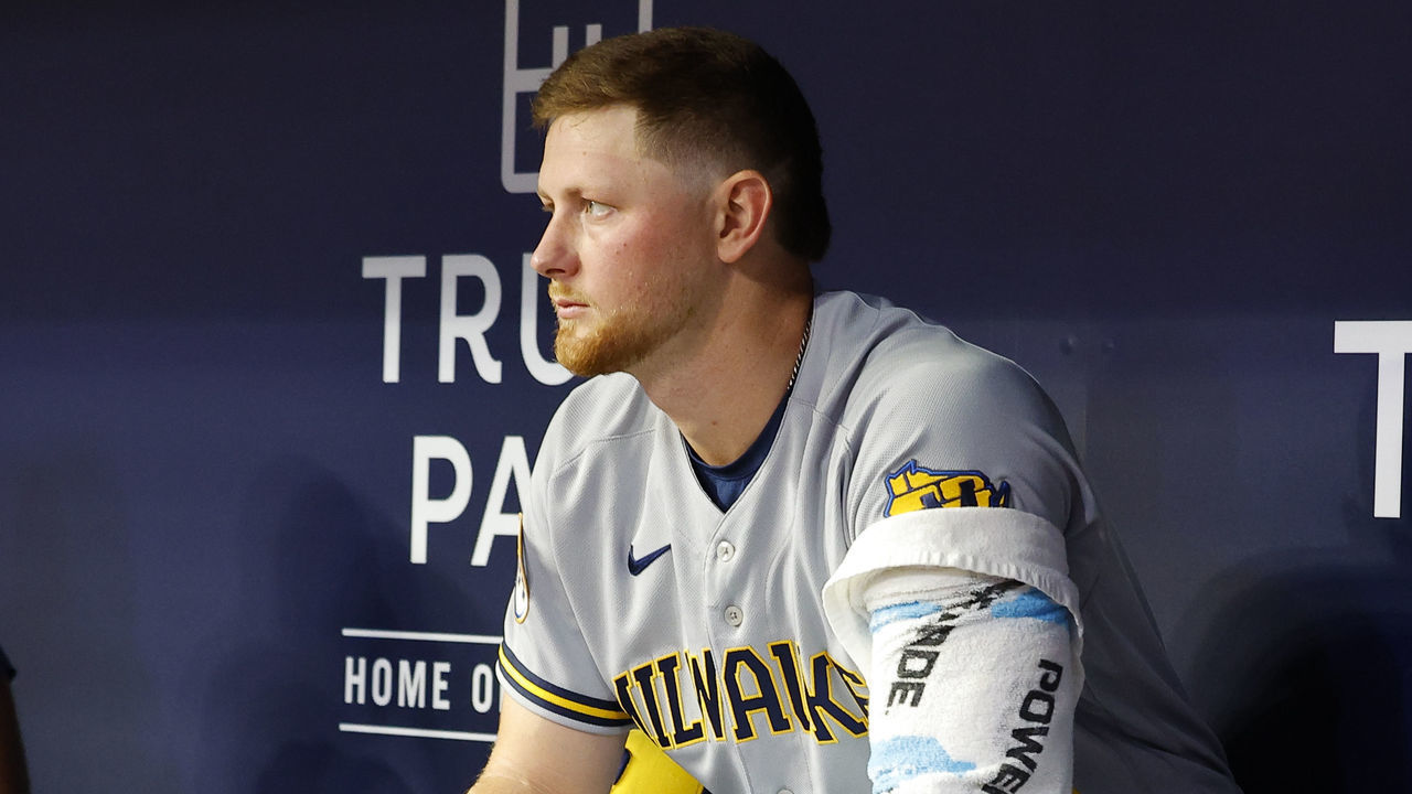 ATLANTA, GA - MAY 06: Eric Lauer #52 of the Milwaukee Brewers sits in the dugout during the sixth inning against the Atlanta Braves at Truist Park on May 6, 2022 in Atlanta, Georgia.