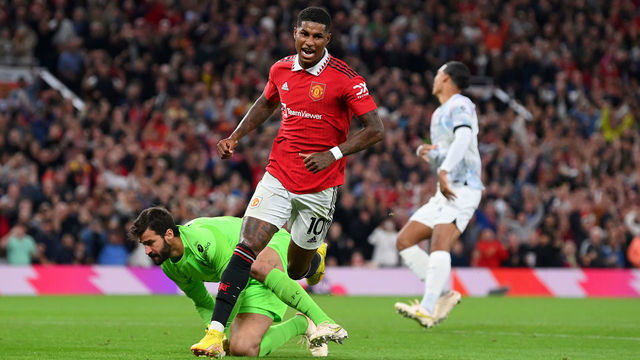 MANCHESTER, ENGLAND - AUGUST 22: Marcus Rashford of Manchester United celebrates after scoring their team's second goal during the Premier League match between Manchester United and Liverpool FC at Old Trafford on August 22, 2022 in Manchester, England.