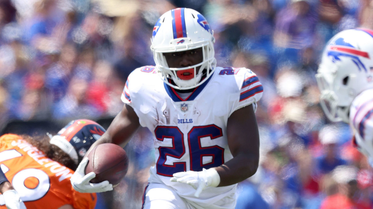 ORCHARD PARK, NEW YORK - AUGUST 20: Devin Singletary #26 of the Buffalo Bills runs the ball during the first quarter of a preseason game against the Denver Broncos at Highmark Stadium on August 20, 2022 in Orchard Park, New York.