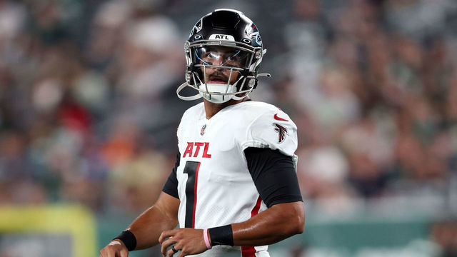 EAST RUTHERFORD, NEW JERSEY - AUGUST 22: Quarterback Marcus Mariota #1 of the Atlanta Falcons walks off the field during the 1st quarter of the preseason game against the New York Jets at MetLife Stadium on August 22, 2022 in East Rutherford, New Jersey.