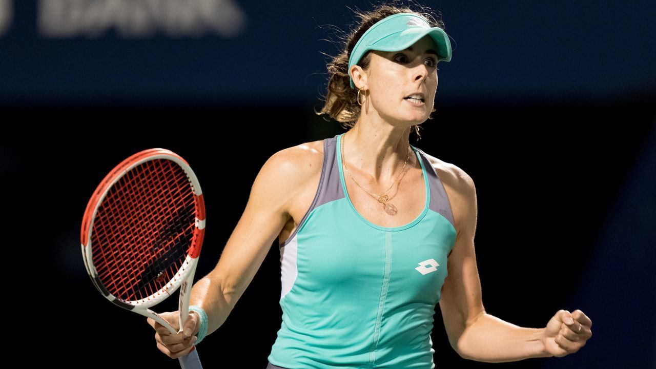TORONTO, ON - AUGUST 10: Alize Cornet celebrates after winning the second set during her National Bank Open tennis tournament second round match on August 10, 2022, at Sobeys Stadium in Toronto, ON, Canada.