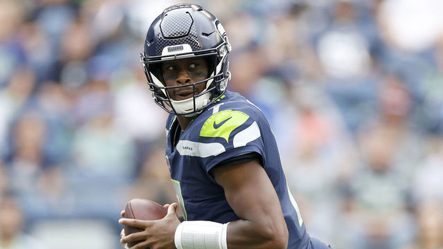SEATTLE, WASHINGTON - AUGUST 18: Geno Smith #7 of the Seattle Seahawks looks to pass in the first half during the preseason game between the Seattle Seahawks and the Chicago Bears at Lumen Field on August 18, 2022 in Seattle, Washington.