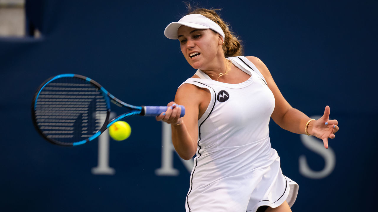 TORONTO, ONTARIO - AUGUST 08: Sofia Kenin of the United States hits a shot against Sloane Stephens of the United States during her first round match on Day 3 of the National Bank Open, part of the Hologic WTA Tour, at Sobeys Stadium on August 08, 2022 in Toronto, Ontario