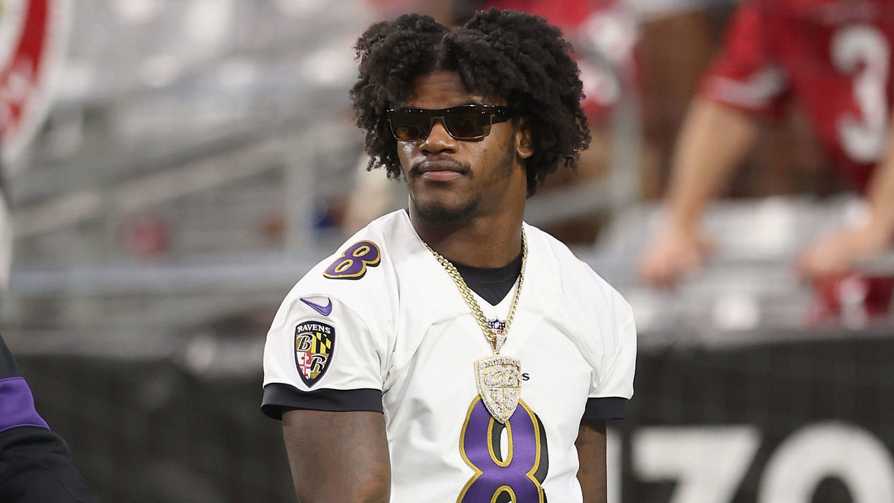 GLENDALE, ARIZONA - AUGUST 21: Quarterback Lamar Jackson #8 of the Baltimore Ravens on the sidelines during the first half of the NFL preseason game against the Arizona Cardinals at State Farm Stadium on August 21, 2022 in Glendale, Arizona. The Ravens defeated the Cardinals 24-17.