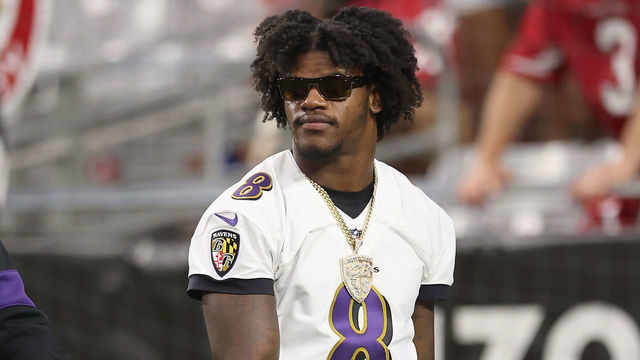 GLENDALE, ARIZONA - AUGUST 21: Quarterback Lamar Jackson #8 of the Baltimore Ravens on the sidelines during the first half of the NFL preseason game against the Arizona Cardinals at State Farm Stadium on August 21, 2022 in Glendale, Arizona. The Ravens defeated the Cardinals 24-17.