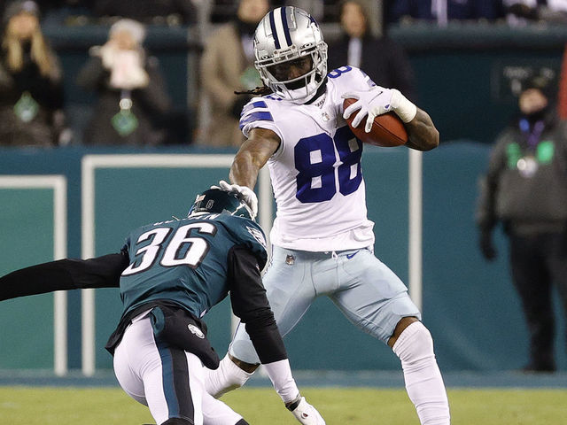 PHILADELPHIA, PENNSYLVANIA - JANUARY 08: CeeDee Lamb #88 of the Dallas Cowboys avoids a tackle from Tay Gowan #36 of the Philadelphia Eagles at Lincoln Financial Field on January 08, 2022 in Philadelphia, Pennsylvania.