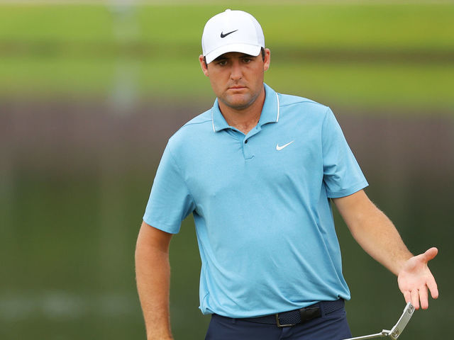 ATLANTA, GEORGIA - AUGUST 25: Scottie Scheffler of the United States lines up a putt on the 15th green during the first round of the TOUR Championship at East Lake Golf Club on August 25, 2022 in Atlanta, Georgia.