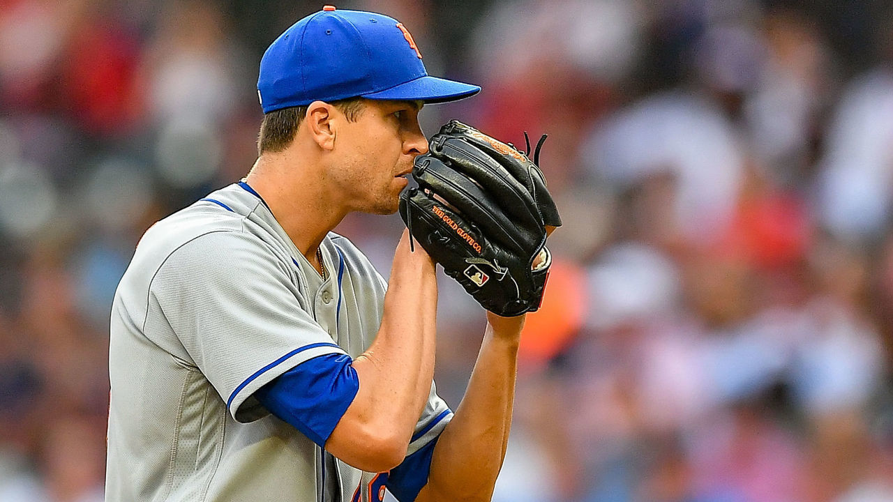 ATLANTA, GA August 18: New York starting pitcher Jacob deGrom (48) looks in for the sign during the MLB game between the New York Mets and the Atlanta Braves on August 18th, 2022 at Truist Park in Atlanta, GA.