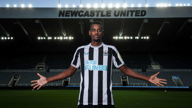 NEWCASTLE UPON TYNE, ENGLAND - AUGUST 26: Alexander Isak poses for photos after signing for Newcastle United at St. James Park on August 26, 2022 in Newcastle upon Tyne, England.