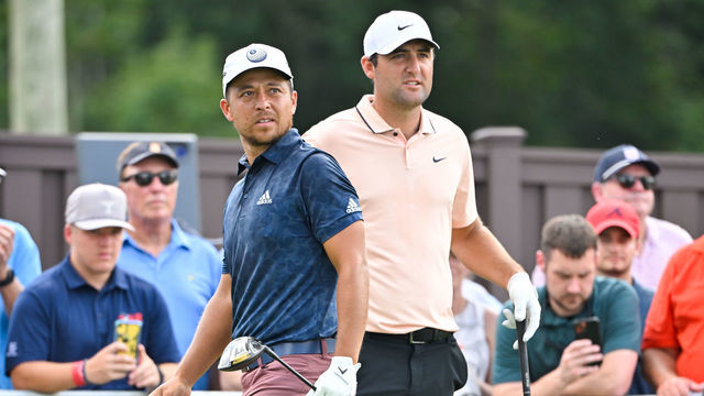 ATLANTA, GEORGIA - AUGUST 26: Scottie Scheffler and Xander Schauffele walk near each other on the ninth tee box during the second round of the TOUR Championship at East Lake Golf Club on August 26, 2022 in Atlanta, Georgia.