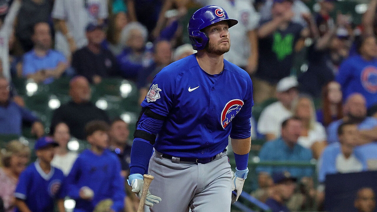 MILWAUKEE, WISCONSIN - AUGUST 26: Ian Happ #8 of the Chicago Cubs hits a two run home run during the tenth inning against the Milwaukee Brewers at American Family Field on August 26, 2022 in Milwaukee, Wisconsin.