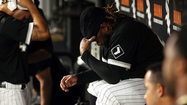 CHICAGO, ILLINOIS - AUGUST 26: Johnny Cueto #47 of the Chicago White Sox wipes sweat from his forehead in the dugout after allowing six runs in the second inning at Guaranteed Rate Field on August 26, 2022 in Chicago, Illinois.