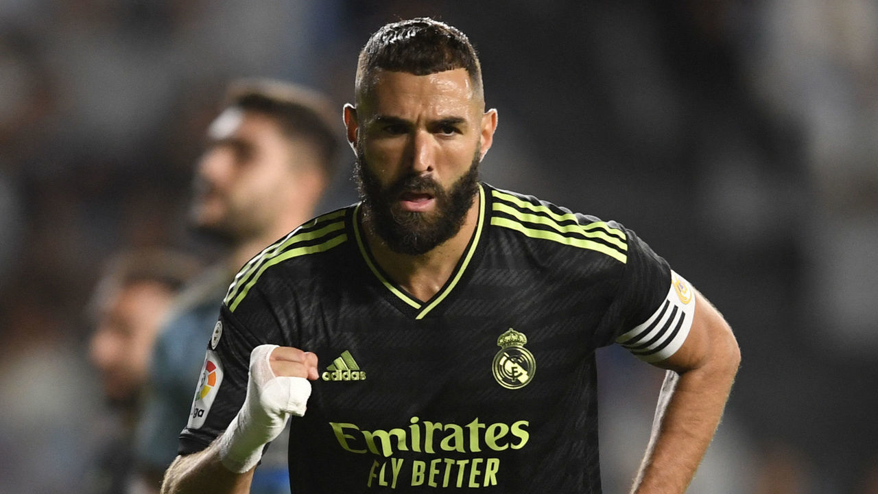 Real Madrid's French forward Karim Benzema celebrates scoring his team's first goal during the Spanish League football match between RC Celta de Vigo and Real Madrid CF at the Balaidos stadium in Vigo on August 20, 2022.