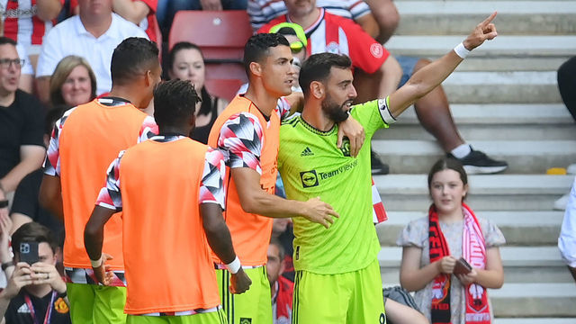 SOUTHAMPTON, ENGLAND - AUGUST 27: Bruno Fernandes celebrates with Cristiano Ronaldo of Manchester United after scoring their team's first goal during the Premier League match between Southampton FC and Manchester United at Friends Provident St. Mary's Stadium on August 27, 2022 in Southampton, England.