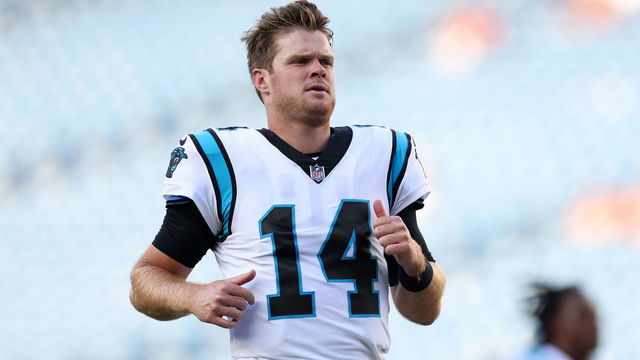 FOXBOROUGH, MASSACHUSETTS - AUGUST 19: Sam Darnold #14 of the Carolina Panthers warms up before the preseason game between the New England Patriots and the Carolina Panthers at Gillette Stadium on August 19, 2022 in Foxborough, Massachusetts.