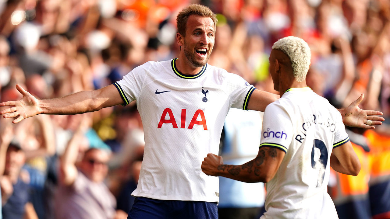 Tottenham Hotspur's Harry Kane (left) celebrates scoring their side's second goal of the game with team-mate Richarlison during the Premier League match at the City Ground, Nottingham. Picture date: Sunday August 28, 2022.