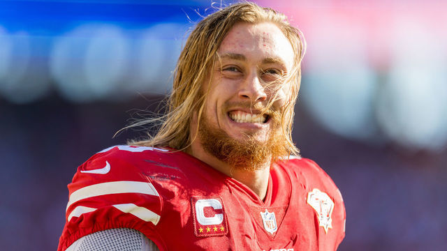 SANTA CLARA, CA - JANUARY 02: San Francisco 49ers Tight End George Kittle (85) smiles during a timeout during the NFL pro football game between the Houston Texans and San Francisco 49ers on January 2, 2022 at Levis Stadium in Santa Clara, CA.