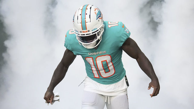 MIAMI GARDENS, FLORIDA - AUGUST 27: Tyreek Hill #10 of the Miami Dolphins takes the field prior to the preseason game against the Philadelphia Eagles at Hard Rock Stadium on August 27, 2022 in Miami Gardens, Florida.