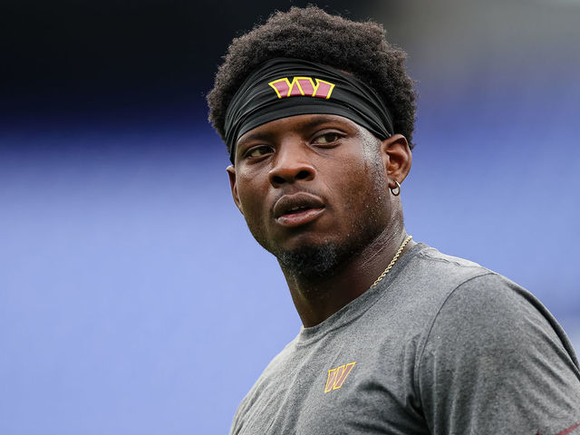 BALTIMORE, MD - AUGUST 27: Brian Robinson #8 of the Washington Commanders warms up before the preseason game against the Baltimore Ravens at M&T Bank Stadium on August 27, 2022 in Baltimore, Maryland.