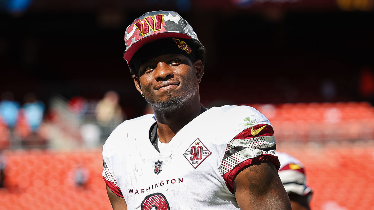 LANDOVER, MD - AUGUST 13: Brian Robinson #8 of the Washington Commanders looks on after the preseason game against the Carolina Panthers at FedExField on August 13, 2022 in Landover, Maryland.