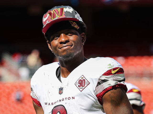 LANDOVER, MD - AUGUST 13: Brian Robinson #8 of the Washington Commanders looks on after the preseason game against the Carolina Panthers at FedExField on August 13, 2022 in Landover, Maryland.