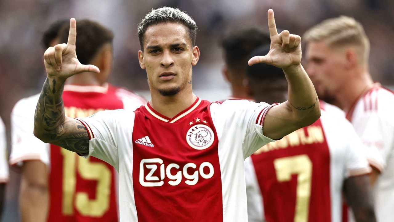 Ajax's Brazilian midfielder Antony Matheus Dos Santos celebrates after scoring the 2-1 goal during the Dutch Eredivisie match between Ajax Amsterdam and FC Groningen at the Johan Cruijff ArenA in Amsterdam, on August 14, 2022. - Netherlands OUT