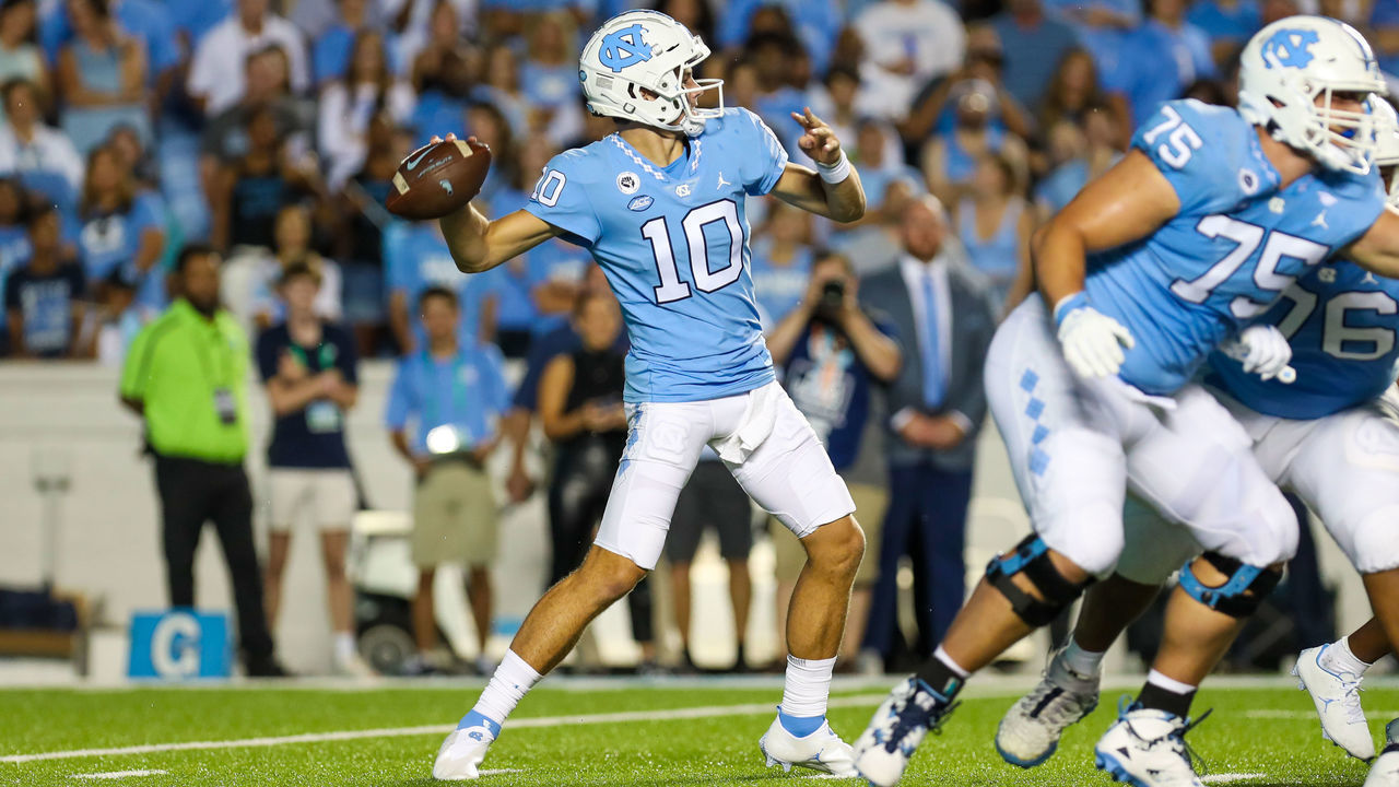CHAPEL HILL, NC - AUGUST 27: Drake Maye (10) of the North Carolina Tar Heels attempts a pass during a football game between the North Carolina Tar Heels and the Florida A&M Rattlers on August 27, 2022, at Kenan Memorial Stadium in Chapel Hill, NC.
