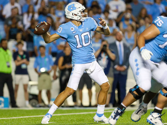 CHAPEL HILL, NC - AUGUST 27: Drake Maye (10) of the North Carolina Tar Heels attempts a pass during a football game between the North Carolina Tar Heels and the Florida A&M Rattlers on August 27, 2022, at Kenan Memorial Stadium in Chapel Hill, NC.