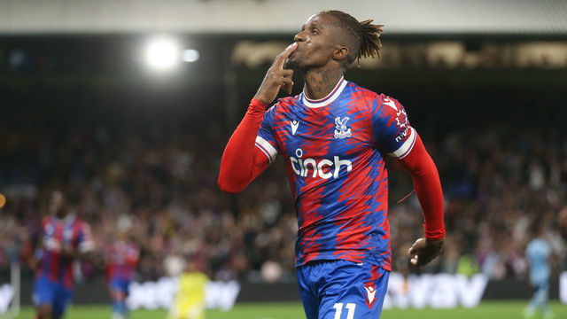 LONDON, ENGLAND - AUGUST 30: Crystal Palace's Wilfried Zaha celebrates scoring his side's first goal during the Premier League match between Crystal Palace and Brentford FC at Selhurst Park on August 30, 2022 in London, United Kingdom.