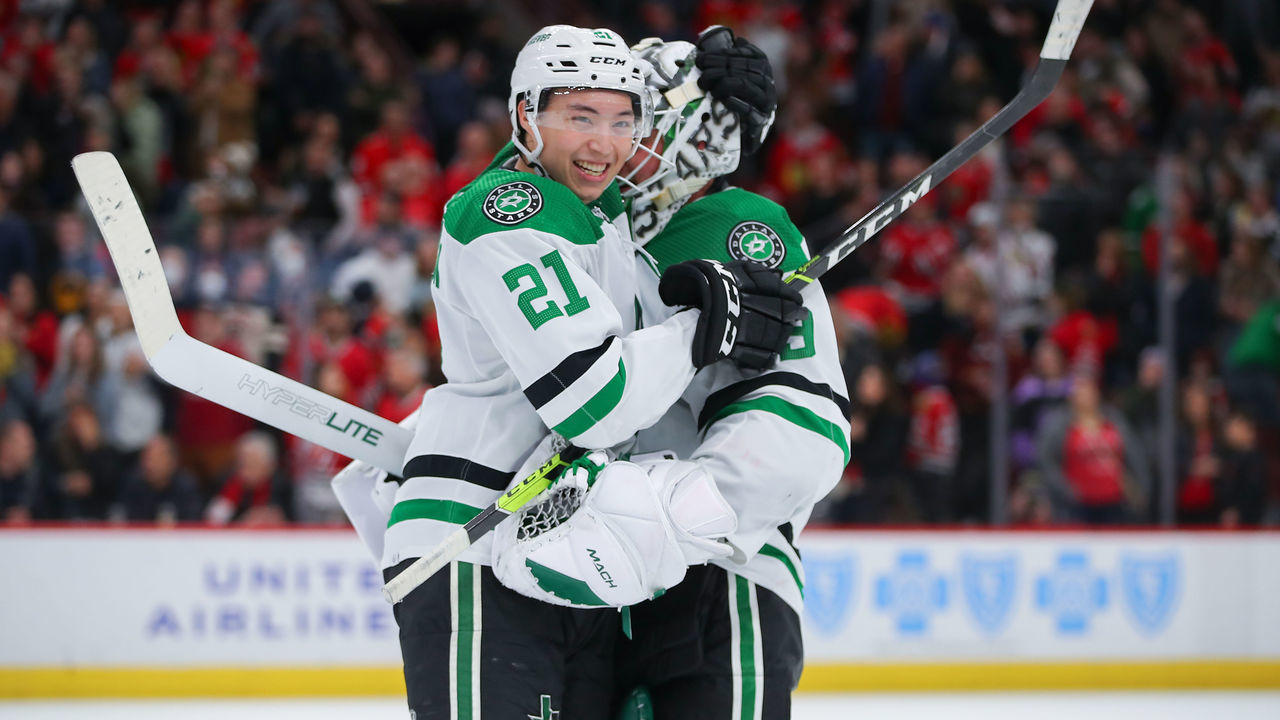 CHICAGO, IL - FEBRUARY 18: Dallas Stars left wing Jason Robertson (21) celebrates with Dallas Stars goaltender Jake Oettinger (29) after a game between the Dallas Stars and the Chicago Blackhawks on February 18, 2022 at the United Center in Chicago, IL.