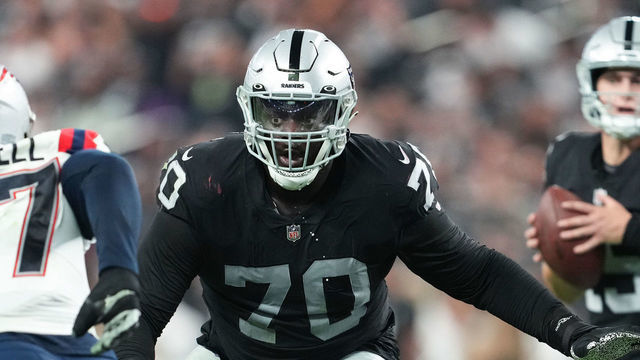 LAS VEGAS, NEVADA - AUGUST 26: Offensive tackle Alex Leatherwood #70 of the Las Vegas Raiders looks to block during the second half of a preseason game against the New England Patriots at Allegiant Stadium on August 26, 2022 in Las Vegas, Nevada.