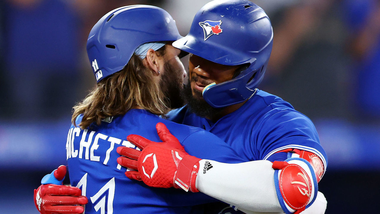TORONTO, ON - AUGUST 30: Teoscar Hernandez #37 of the Toronto Blue Jays celebrates his three-run home run with Bo Bichette #11 in the sixth inning against the Chicago Cubs at Rogers Centre on August 30, 2022 in Toronto, Ontario, Canada.