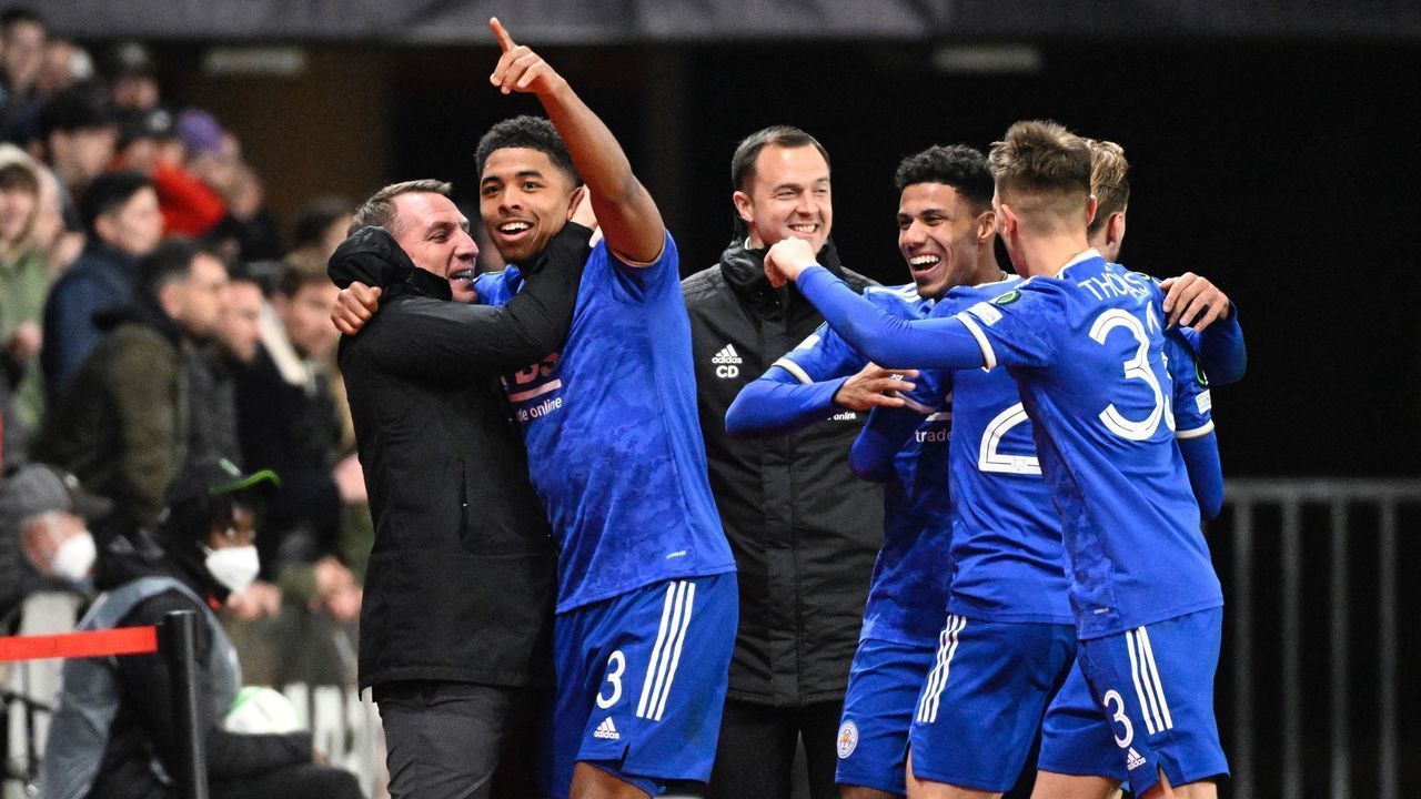 Leicester Citys French defender Wesley Fofana (2nd L) celebrates with Leicester Citys Northern Irish manager Brendan Rodgers (L) during the UEFA Europa Conference League round of 16 second leg football match between Rennes and Leicester City at the Roazhon Park stadium in Rennes, on March 17, 2022.
