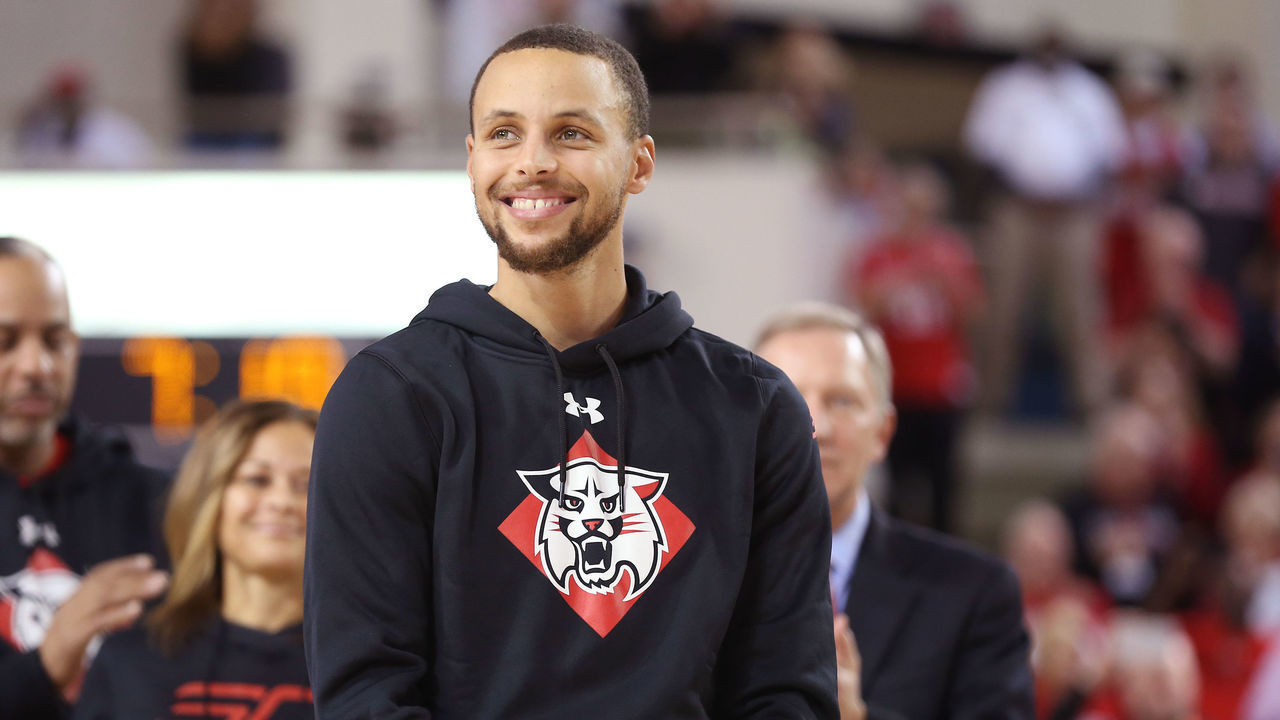 DAVIDSON, NC - JANUARY 24: Stephen Curry #30 of the Golden State Warriors smiles on the court during the ceremony to name the student section after him at Davidson's John M. Belk Area after him at Davidson College on January 24, 2017 in Davidson, North Carolina. Mandatory Copyright Notice: Copyright 2017 NBAE