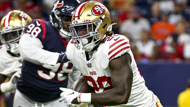 HOUSTON, TEXAS - AUGUST 25: Trey Sermon #28 of the San Francisco 49ers runs the ball during a preseason game against the San Francisco 49ers at NRG Stadium on August 25, 2022 in Houston, Texas.