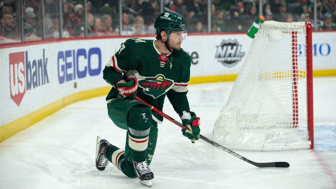 SAINT PAUL, MN - APRIL 29: Minnesota Wild Defenceman Dmitry Kulikov (7) lays on the ice after being hit during the NHL game between the Colorado Avalanche and the Minnesota Wild on April 29th, 2022, at Xcel Energy Center in Saint Paul, MN.