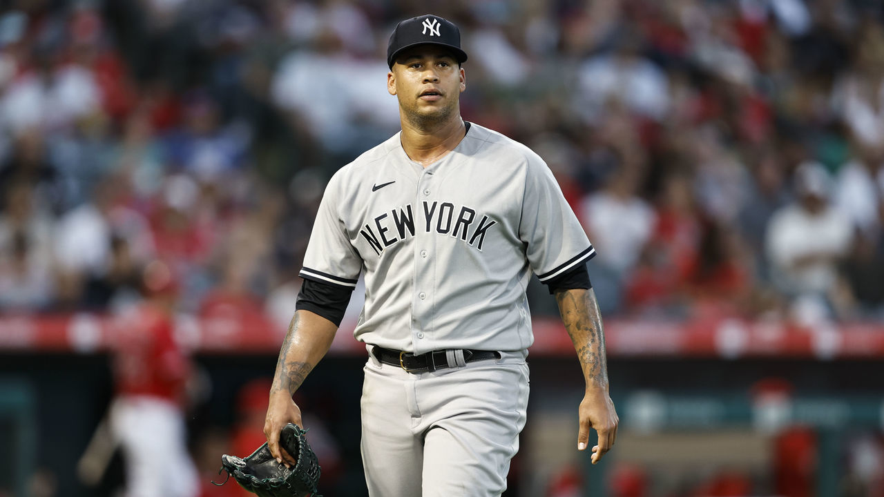 ANAHEIM, CALIFORNIA - AUGUST 29: Frankie Montas #47 of the New York Yankees walks to the dugout during the second inning of a game between the Los Angeles Angels and the New York Yankees at Angel Stadium of Anaheim on August 29, 2022 in Anaheim, California.