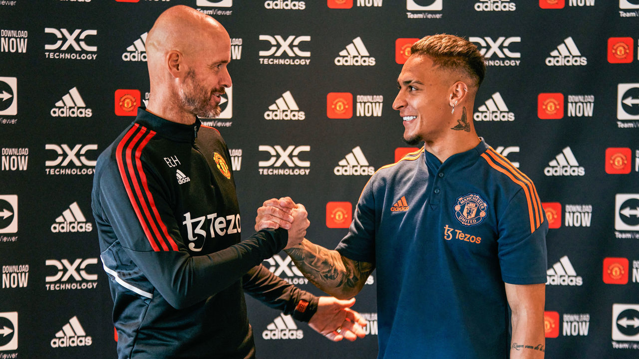 MANCHESTER, ENGLAND - SEPTEMBER 01: New Manchester United signing Antony is greeted by Manchester United Head Coach / Manager Erik ten Hag at Carrington Training Ground on September 01, 2022 in Manchester, England.